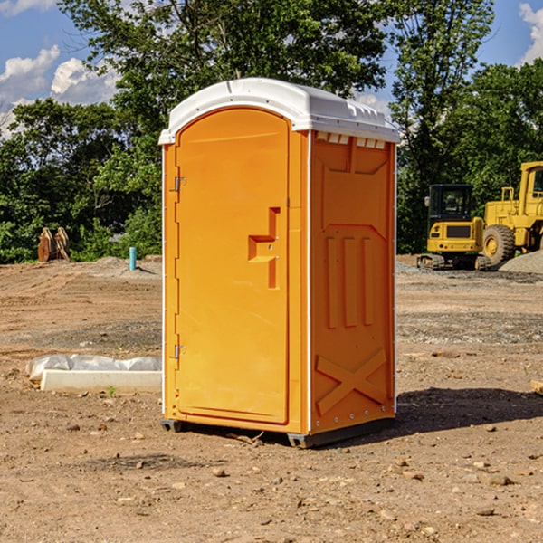 what is the cost difference between standard and deluxe portable restroom rentals in Randolph